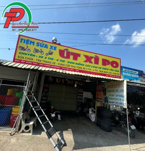 Bảng hiệu tiệm sửa xe